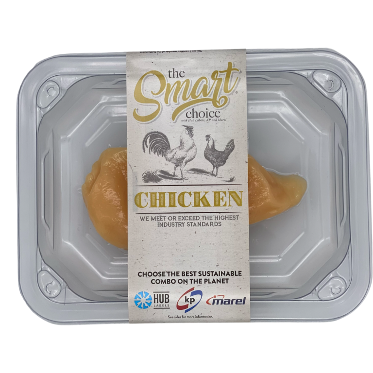 Linerless Label wrapped around a faux Chicken breast in food tray.