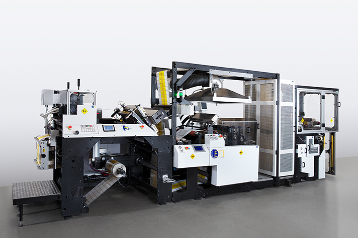 ETI Coating Machine for applying linerless labels to food packaging
